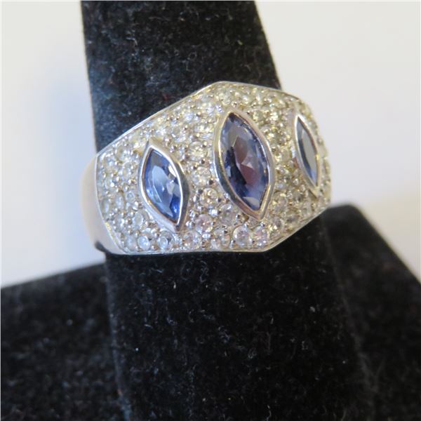 925 Silver ring with clear and blue stones.  Very nice.  Approx size 8.  Band is marked 925