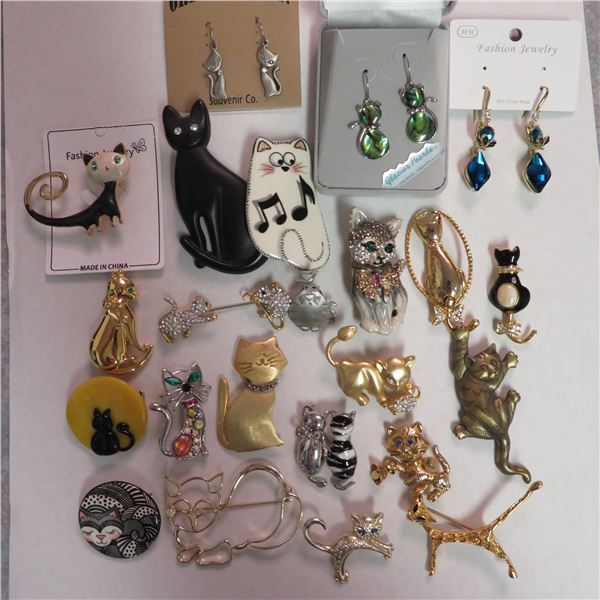 CAT lovers lot!  This lot contains 3 pairs of cat earrings and 20 cat brooches