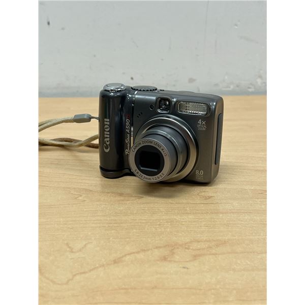 Canon Power Shot A590IS Digital Camera - Uses AA batteries. No SD card. Not tested, see photos