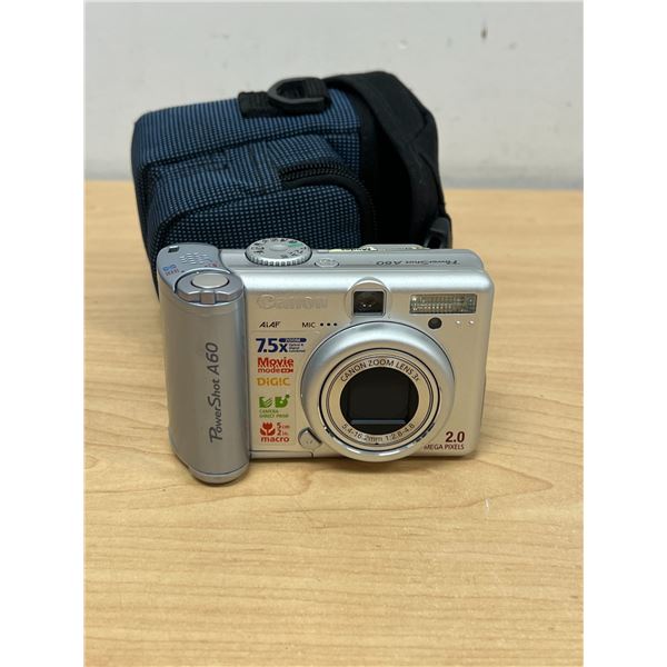 Canon Power Shot A60 Digital Camera - Uses AA batteries. No SD card. Not tested, see photos