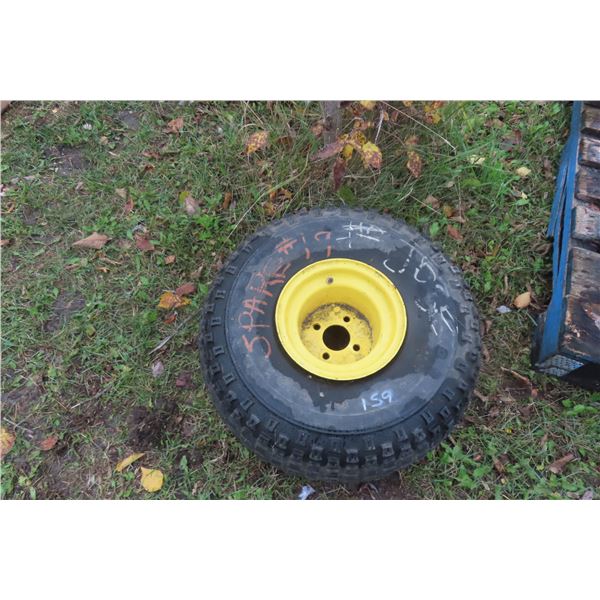 At 25 X 12-9 Tire and Rim