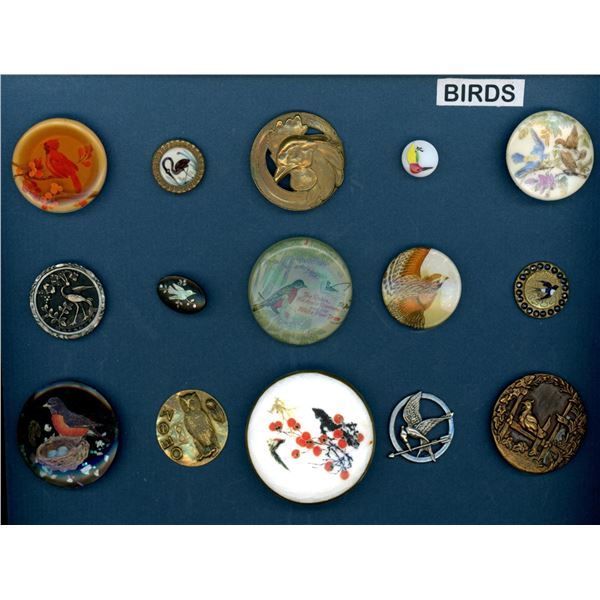 A small card of division 1 & 3 assorted material buttons