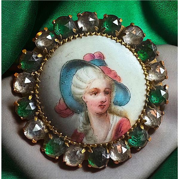 A small card of division three studio artist buttons