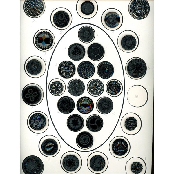 A card of division one assorted black glass buttons