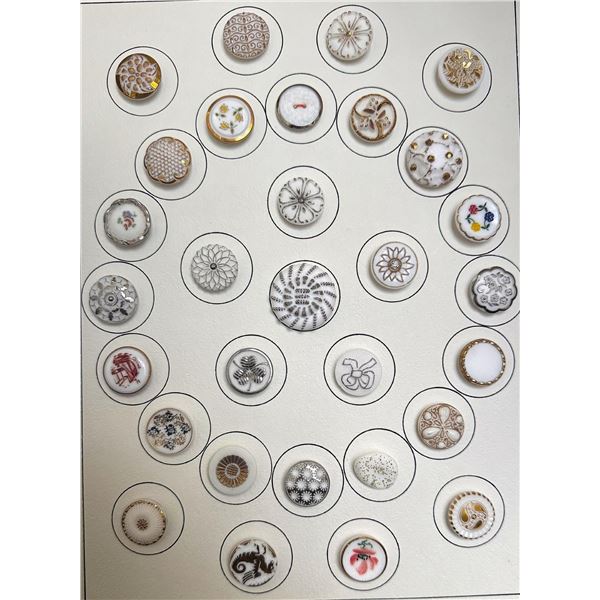 A card of division three glass buttons.