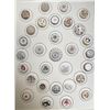 Image 1 : A card of division three glass buttons.