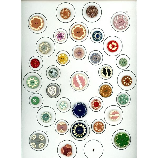 A card of division three celluloid buttons