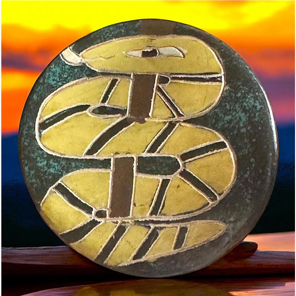 A division three hand made pottery button