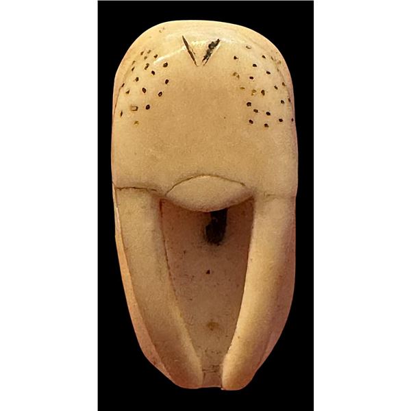 A division one Inuit realistic animal button