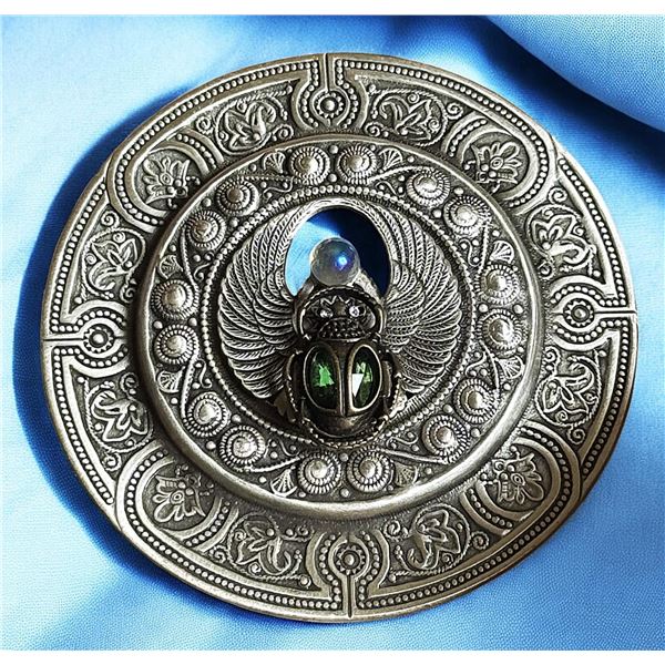 A division three pierced metal scarab button