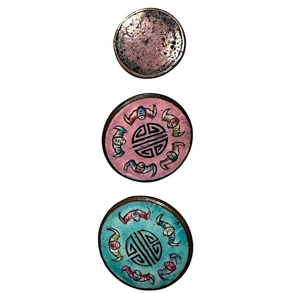 A small card of division one Asian enamel buttons