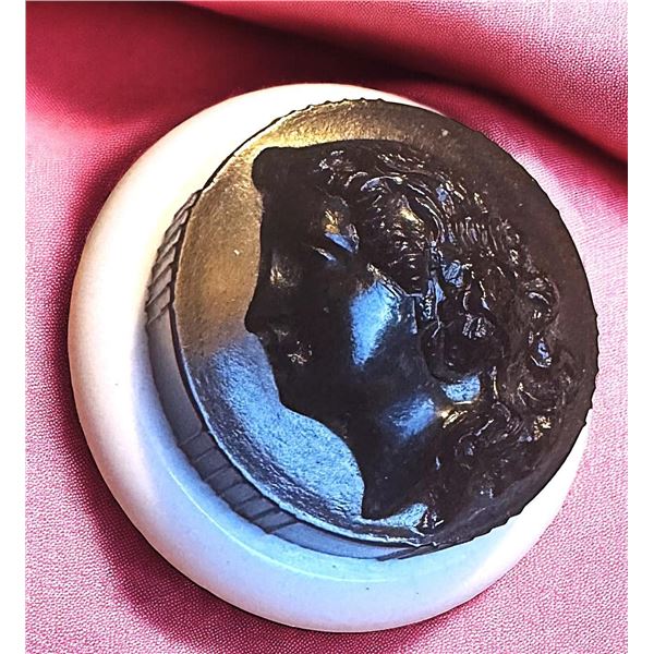 A division three two piece make-up button