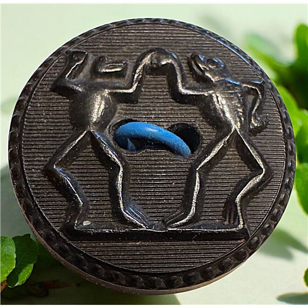 A division one pictorial rubber button