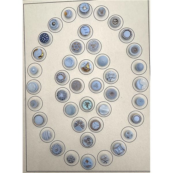 A card of division three glass buttons.