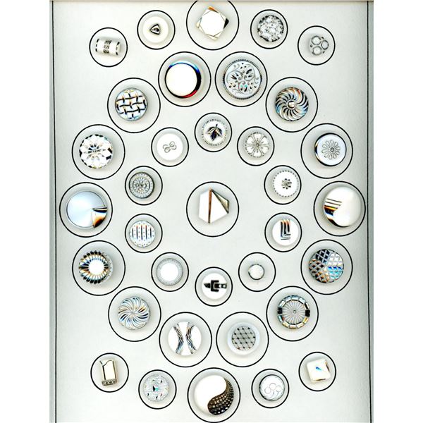 A card of division three glass buttons.