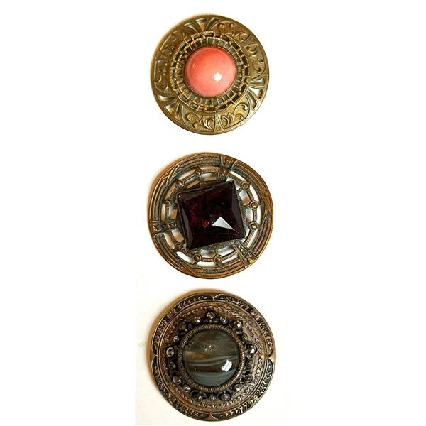 A small card of division one Glass in metal buttons