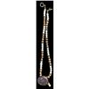 Image 1 : A pearl style beaded necklace with a button