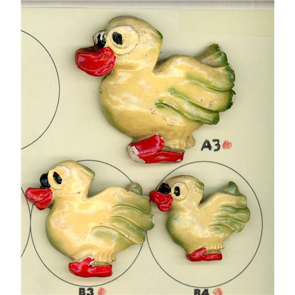 A small card of division three Plaster buttons
