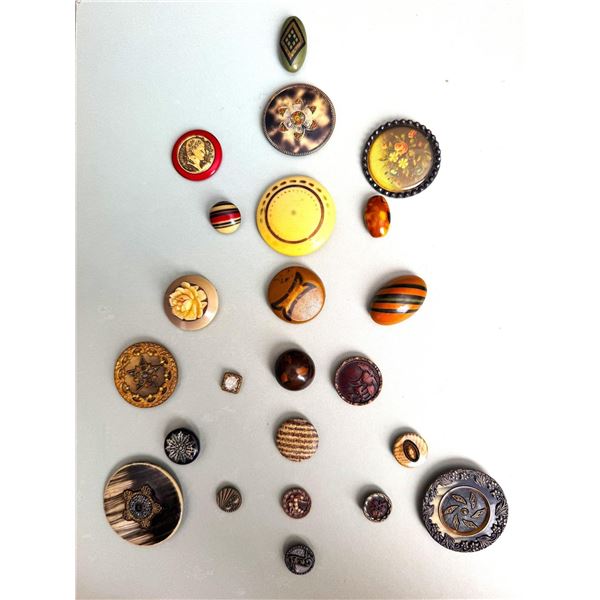 A card of division 1 & 3 assorted celluloid buttons