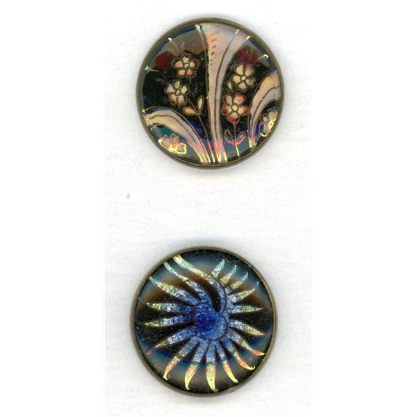 A small card of division one glass in metal buttons