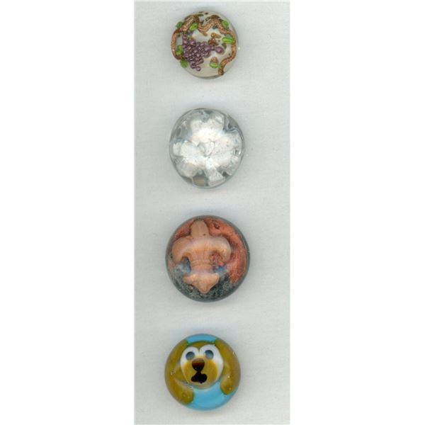 A small card of division three studio artist buttons