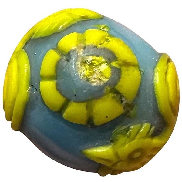 A division three hand crafted glass button
