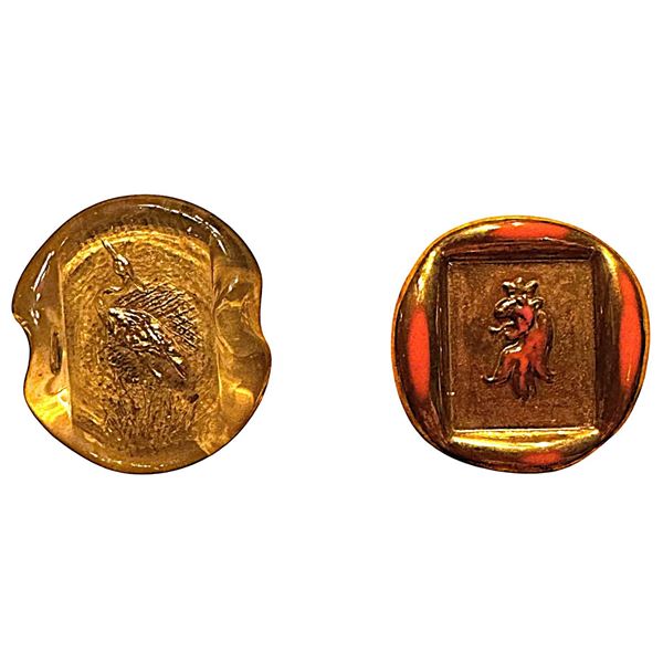 A small card of division three English glass buttons