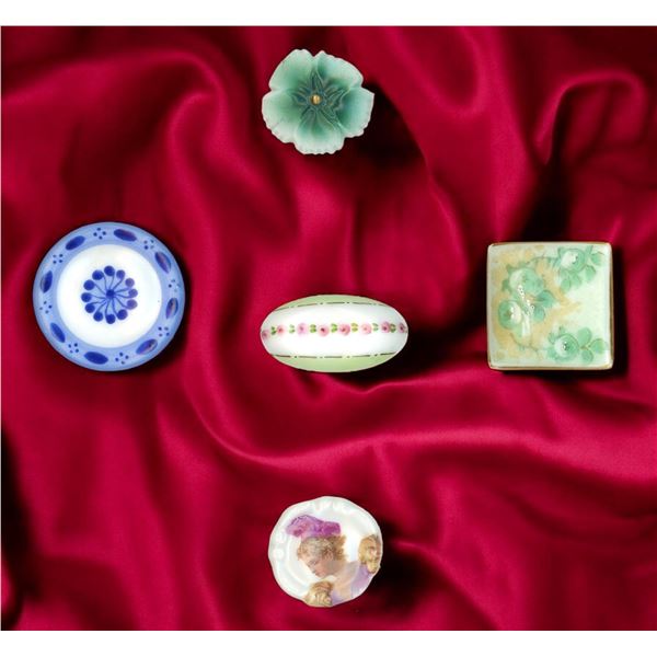A small card of division one & three ceramic buttons