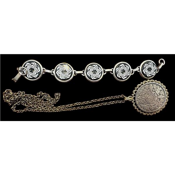 A small group of a Necklace and bracelet with buttons