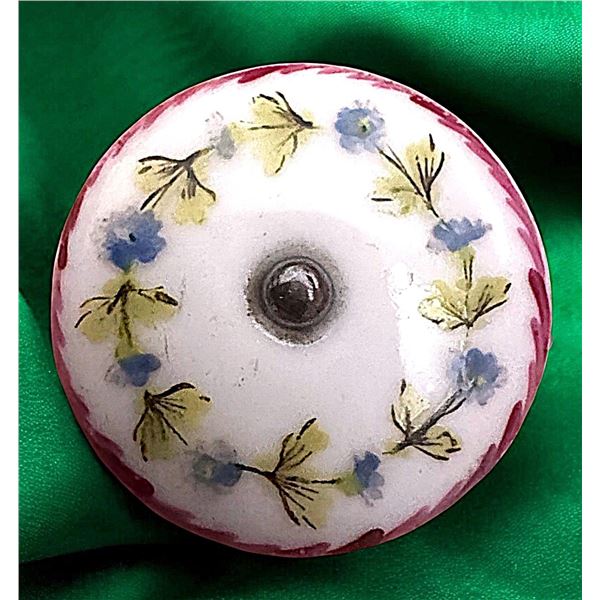 A division one hand painted ceramic button