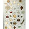 Image 1 : A card of assorted material buttons