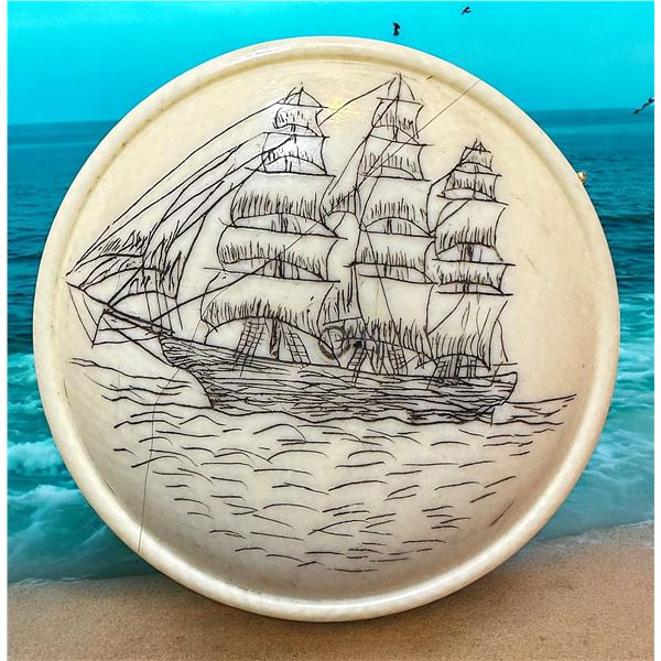 A hand crafted engraved natural material button