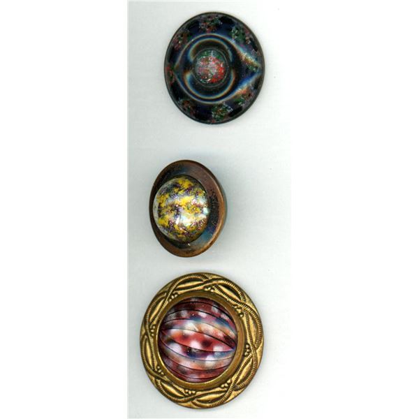 A small card of division one glass in metal buttons