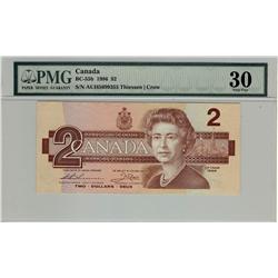 1986 $2 BC-55b AUH5699355 PMG VF30. Only four examples known. An ultra rare Canadian banknote.