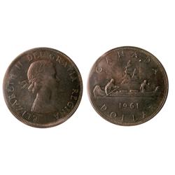 1961 $1 ICCS MS65. A tough date in Gem condition.