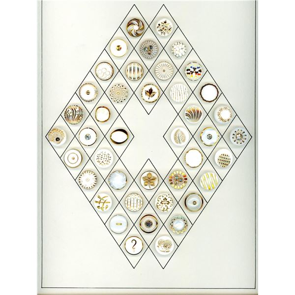 A card of division three glass buttons.