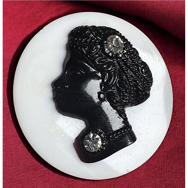 A division one glass identifiable women button