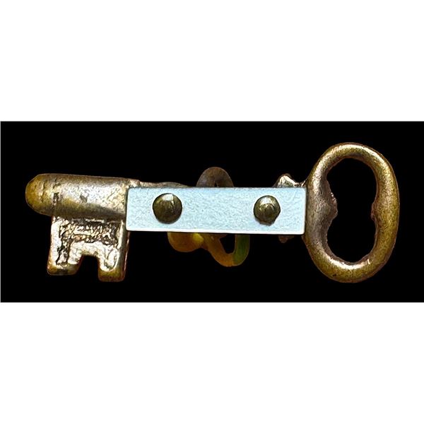 A division one realistic brass and pearl button