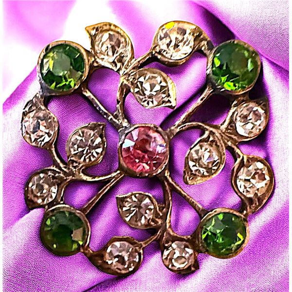 A division one colorful pierced jeweled button