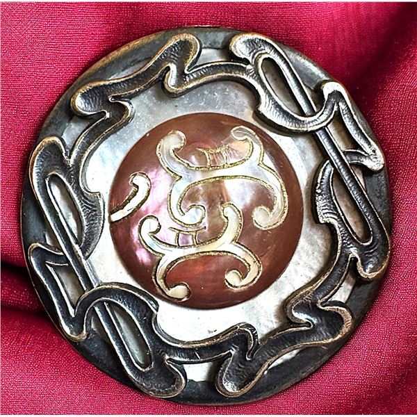 A division one pearl pattern button in metal