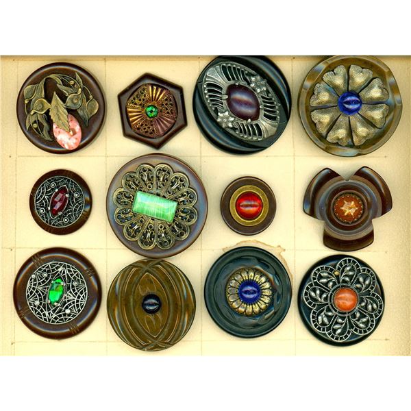 A partial card of division three Bakelite buttons