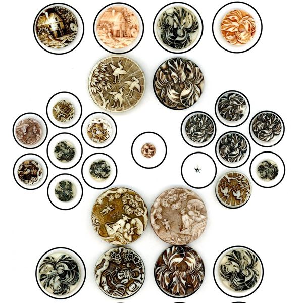 A card of division one pictorial white glass buttons