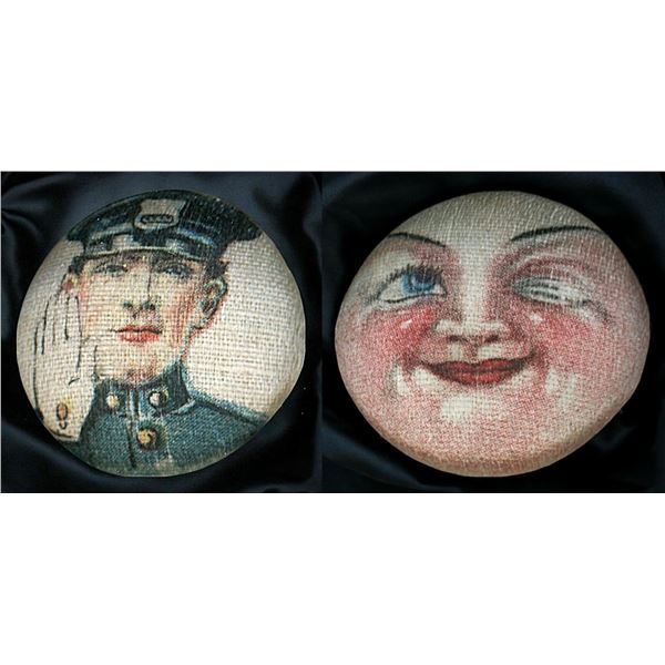 A small card of division three pictorial fabric buttons