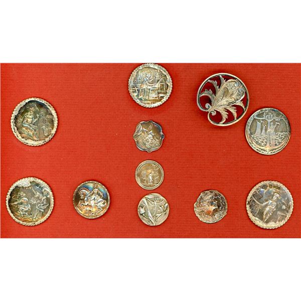A partial card of assorted hallmarked silver buttons