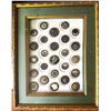 Image 1 : A framed card of division one celluloid buttons