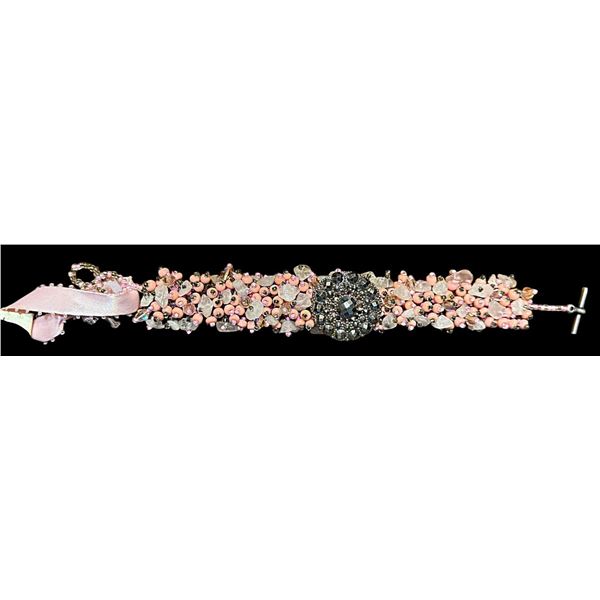 A beautiful handmade bracelet with a button