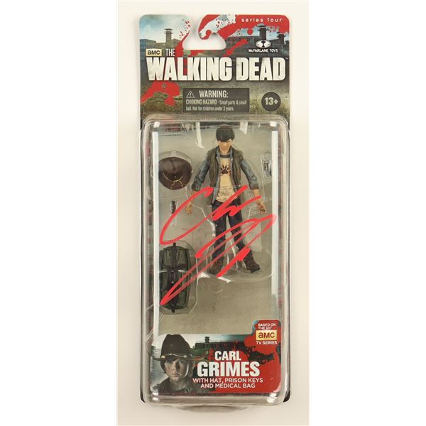 CHANDLER RIGGS SIGNED CARL GRIMES WALKING DEAD ACTION FIGURE - JSA COA