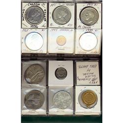 60 Pocket Coin stock Book, complete with a diversity of World, Canadian Coins and medals.  Dates ear
