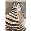Image 6 : XL ZEBRA Hide Rug with a Carpet Backing and Leather Piping