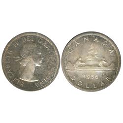 1956 $1 PCGS MS65.  Another nice example with lovely pink and green shades over full underlying lust